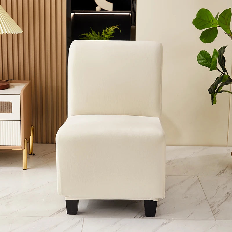 housse fauteuil gris uni moderne pieds noirs lavable machine extensible