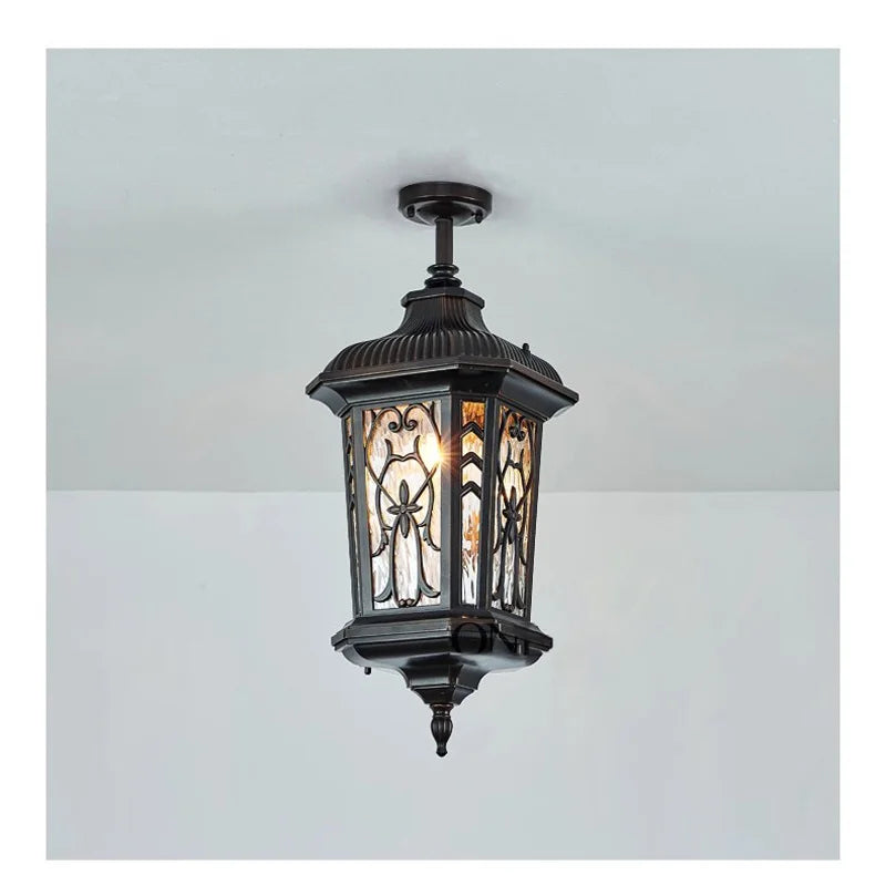 lampe rue classique verre teinté noir doré motifs floraux éclairage extérieur résistant intempéries
