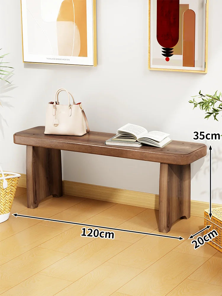 Banc bois marron clair texture naturelle moderne salon tabouret sac main livre ouvert decoration
