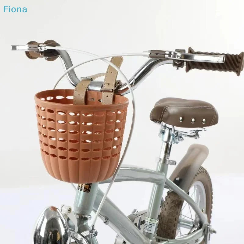 panier vélo enfant orange rose blanc perforé moderne ceinture cuir clip fixe