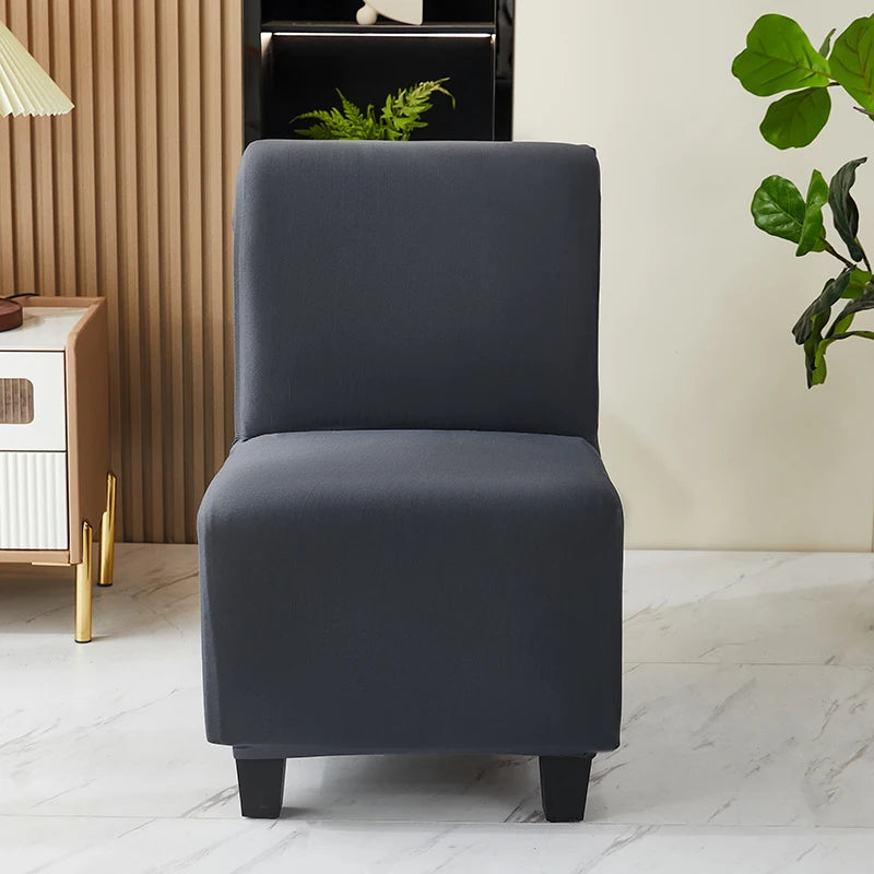 housse fauteuil gris uni moderne pieds noirs lavable machine extensible