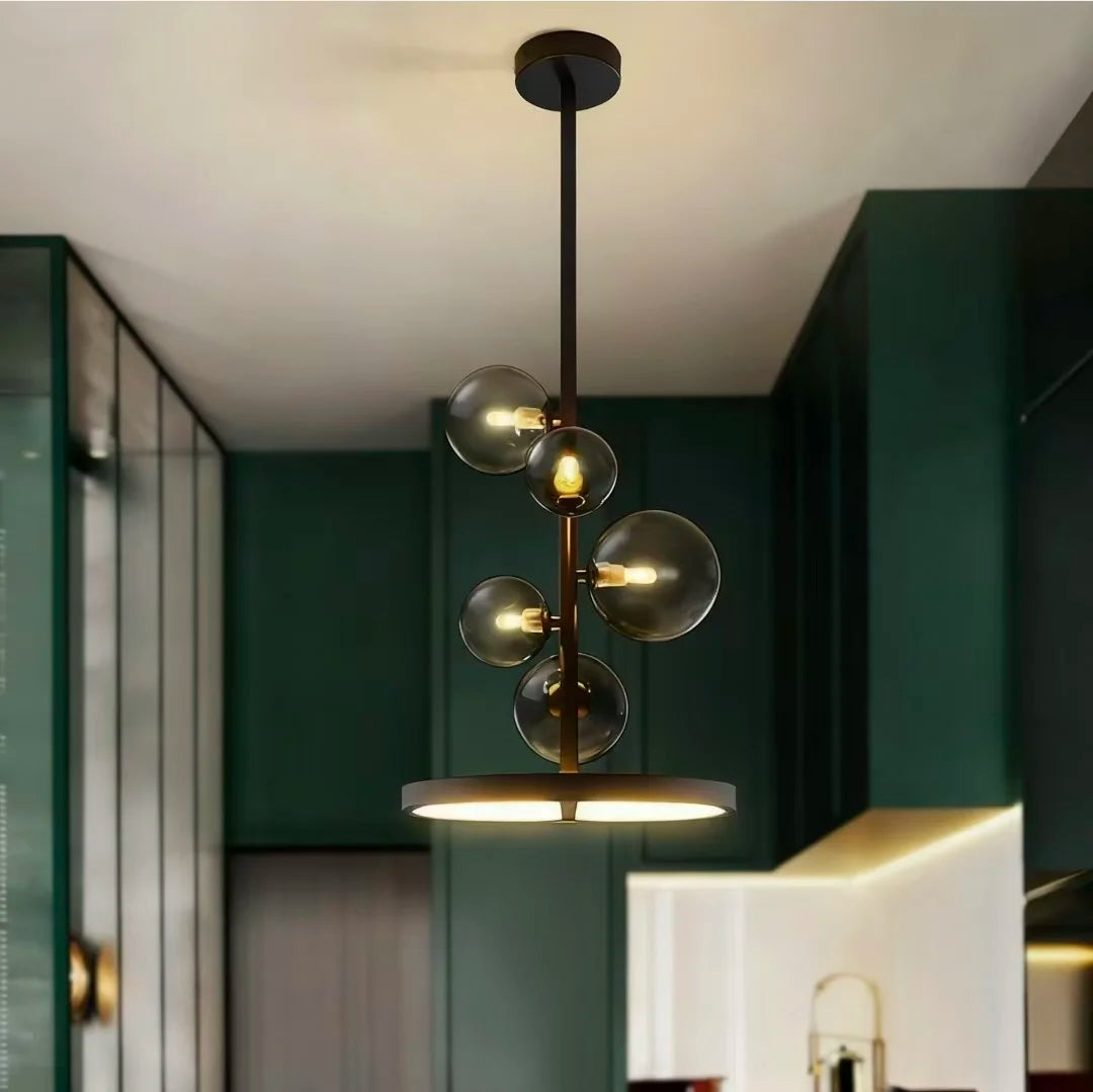 suspension lumineuse moderne sphères verre transparent anneaux métalliques noir doré grisclair