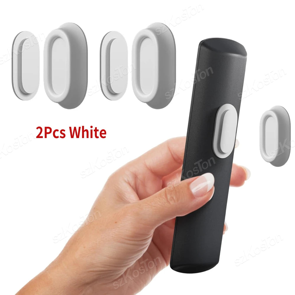 support mural magnétique télécommandes noir blanc adhésif moderne pratique ovale rond multiples