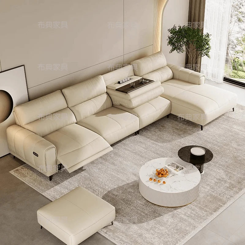 canapé lit simili cuir moderne beige repose pieds tablette intégrée minimaliste table rabattable salon