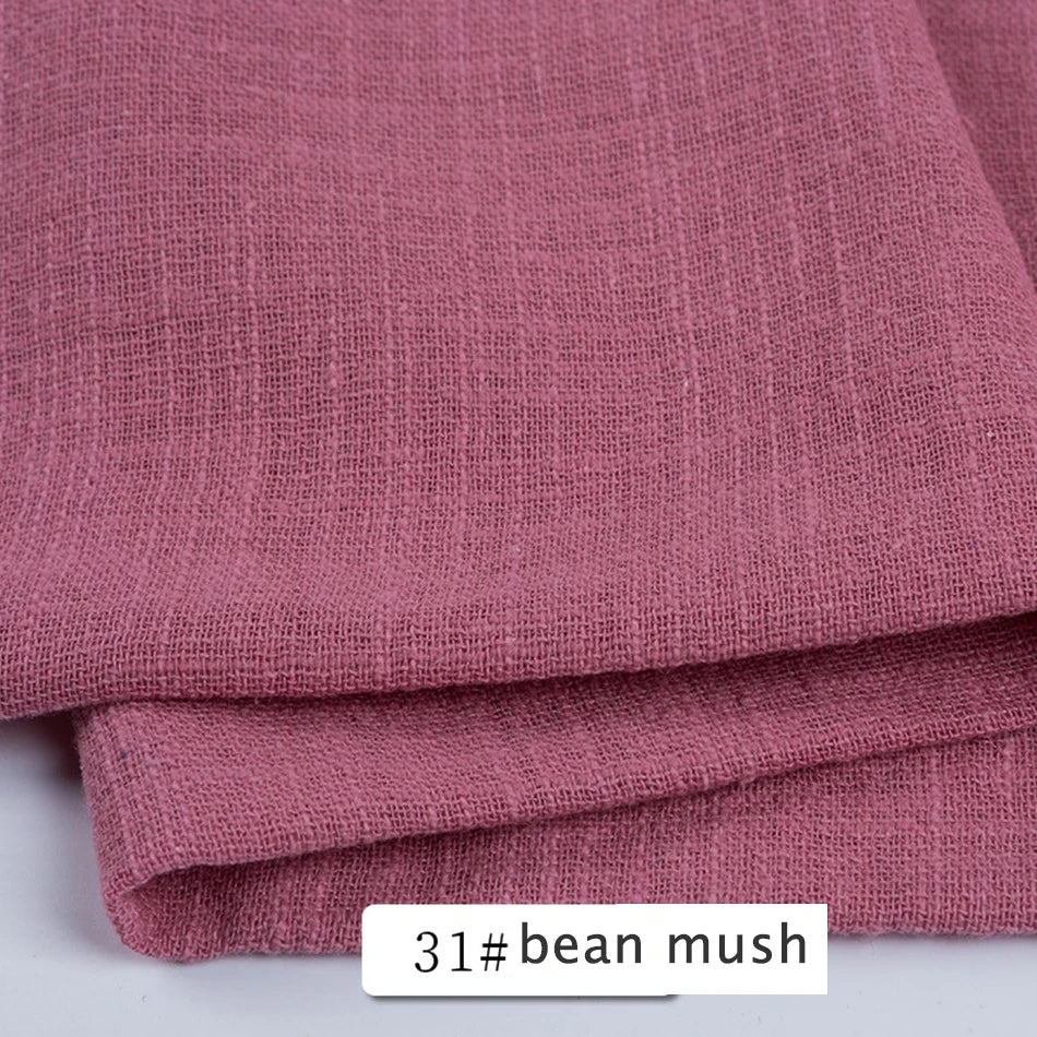 Gros plan sur un tissu rose en lin mélangé, avec indication du code produit "31