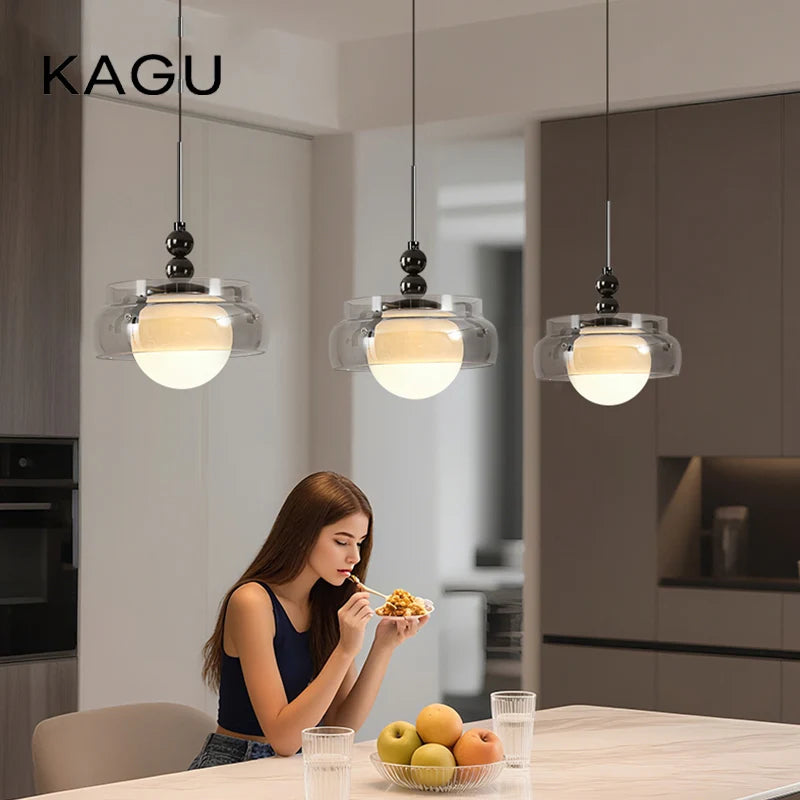 lustre moderne pendentif verre transparent effet fumé lumière blanc chaud salon chambrehôtel