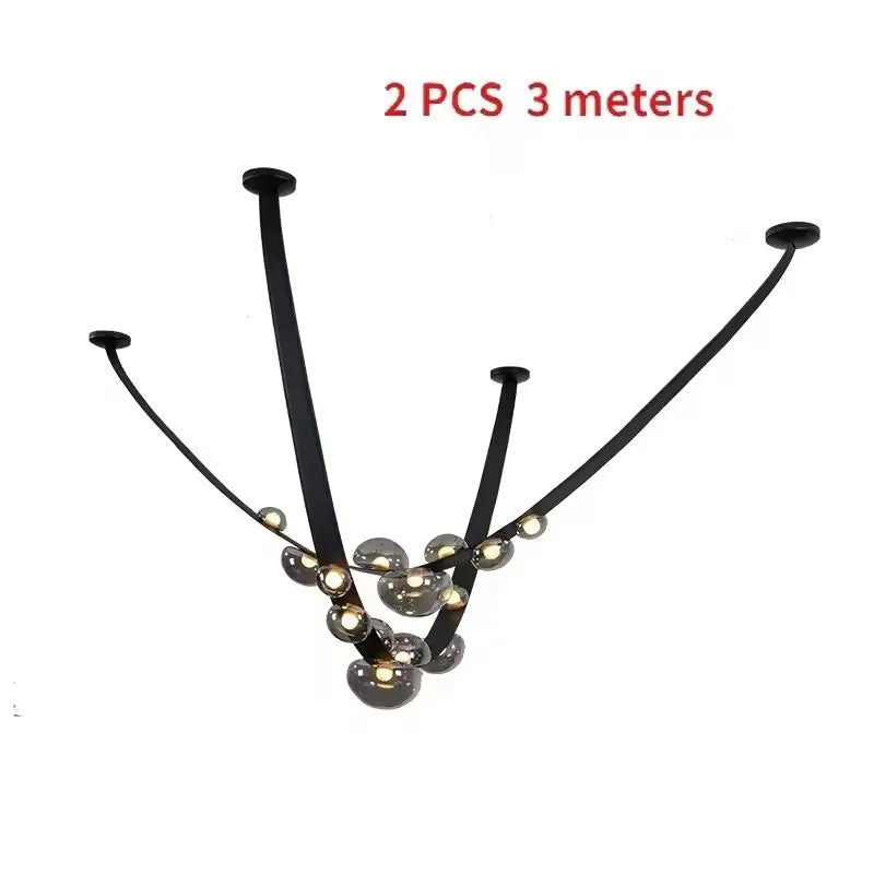 Suspension lumineuse contemporaine boules translucides structure métallique noir marron doré minimaliste