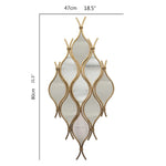 miroirs modernes dorés blancs ovales ondulés élégants décoration muriale chambre coucher