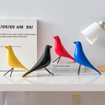 décor oiseau bois peint jaune noir rouge bleu blanc vert pieds métalliques moderne salon