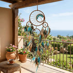 décoration murale attrape rêves boho chic plumes colorées textiles marron bleu gris