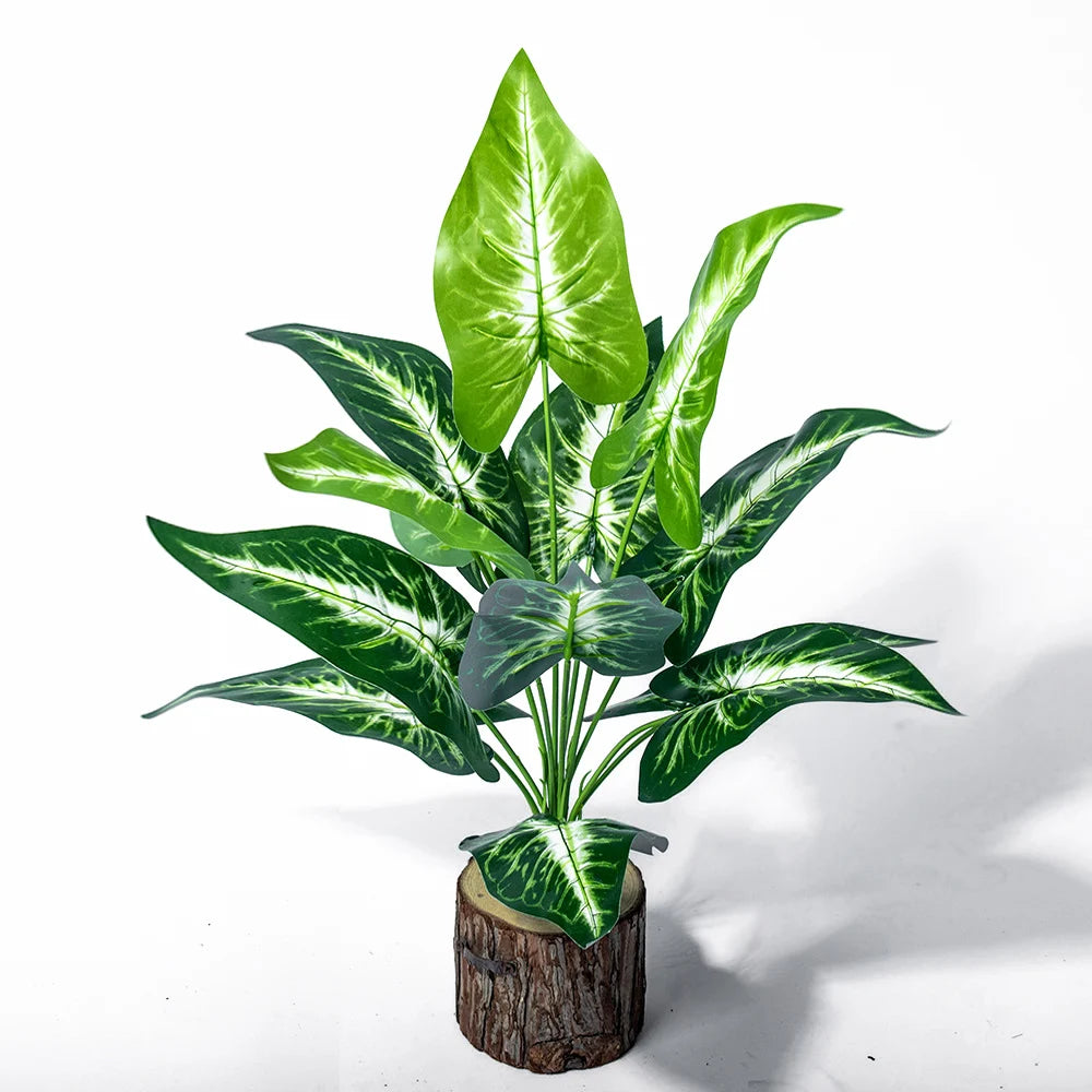 plantes artificielles monstera vert feuilles larges modernes decoration exterieure tronc bois pot ceramique