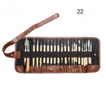 ensemble pinceaux outils céramique sculpture poignées bois métal pointes plastique transparent ergonomiques