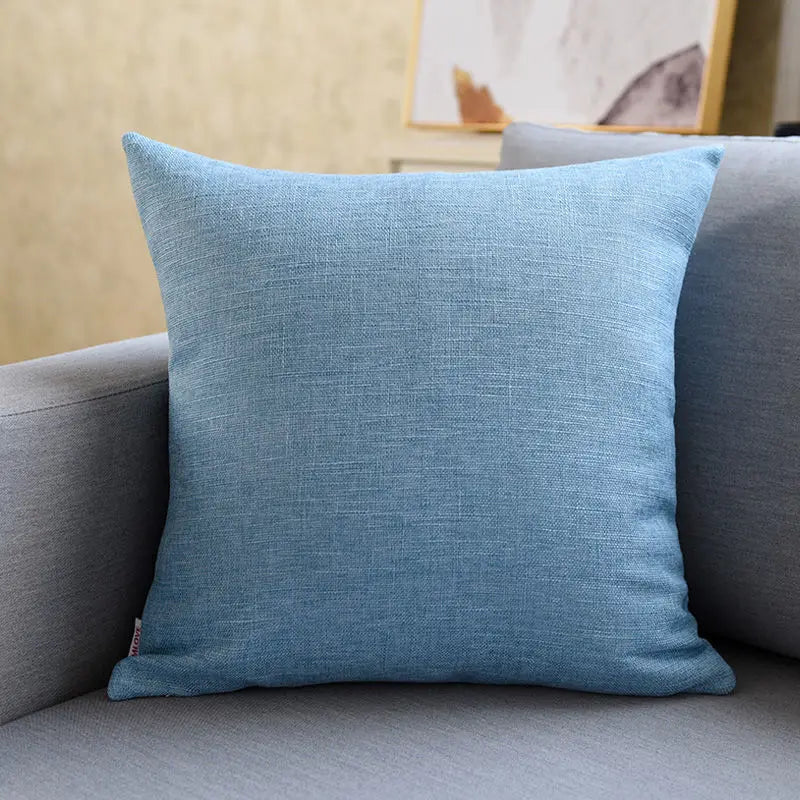 Coussin décoratif gris clair carré pour fauteuil de salon