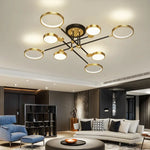 lustre moderne suspension lumineuse tête métallique noir or lisse géométrique chambre salon