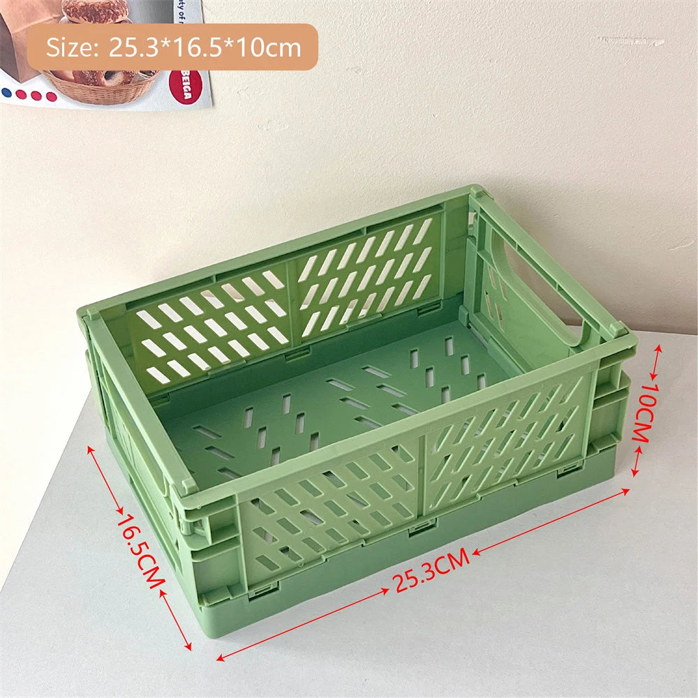 caisse rangement pliable plastique vert beige rose orange violet grille ventilation clips latéraux moderne