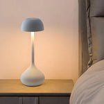 Lampe champignon verte éteinte montrant son design élégant
