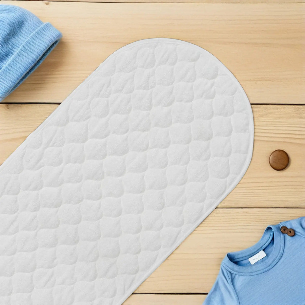 tapis langer ovale imperméable réutilisable motifs losanges blanc bleu clair rose bébé enfant portable
