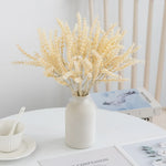 décoration intérieure bouquet feuilles artificielles naturel minimaliste beige gris doré