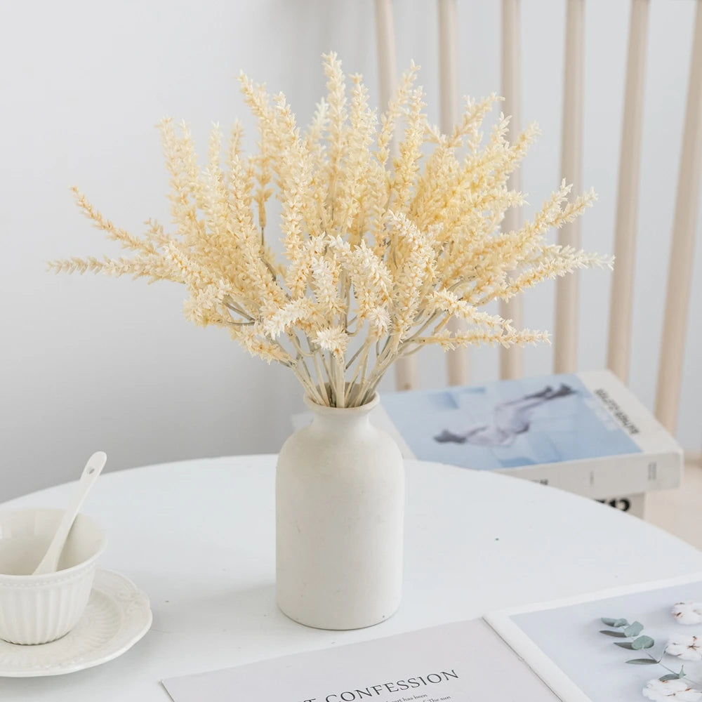 décoration intérieure bouquet feuilles artificielles naturel minimaliste beige gris doré