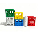 boîtes rangement piles vert blanc jaune bleu rouge grille compartiments pratique moderne