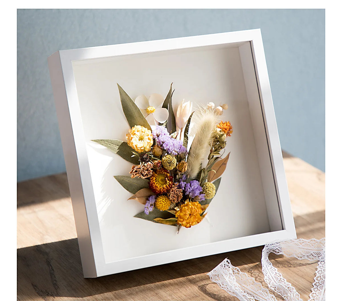 cadres profonds bois clair fleurs séchées coquillages vitre transparente rustique minimaliste