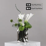 vase moderne argenté brillant fleurs artificielles blanches vertes décoration maison