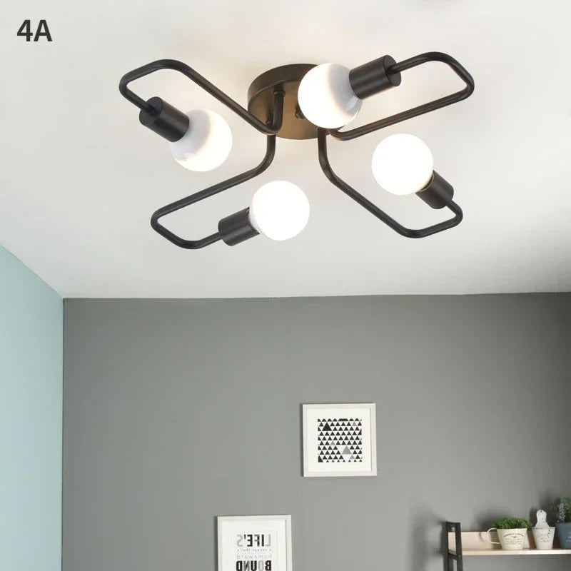 lampe suspension noir blanc moderne scandinave ampoules structure métallique fixations câbles noirs