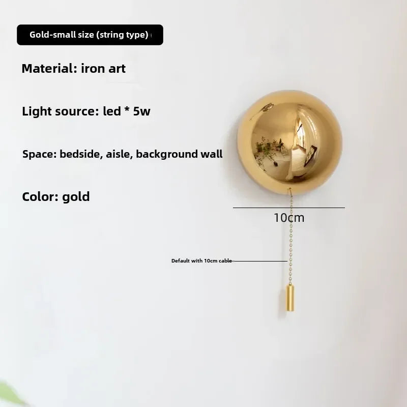 lampe led sphère lumineuse moderne minimaliste argentée dorée noire brillante opaque adhésif