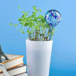 gobelet eau plantes moderne multicolore vert bleu rouge jaune fixations œilletsextérieur arrosage automatisé