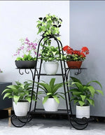 étagère plante métal structure florale courbe élégant pots blancs noirs fixations visuelles