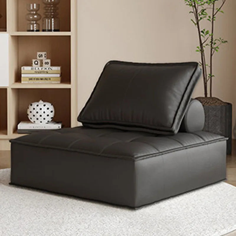 canapé lit moderne cuir noir blanc marron oreillers minimaliste salon