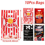 décoration anniversaire thème cinéma assiettes jetables serviettes gobelets nappe guirlande popcorn rouge noir doré
