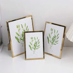 cadre photo moderne or argent feuilles vertes acrylique transparent minimaliste