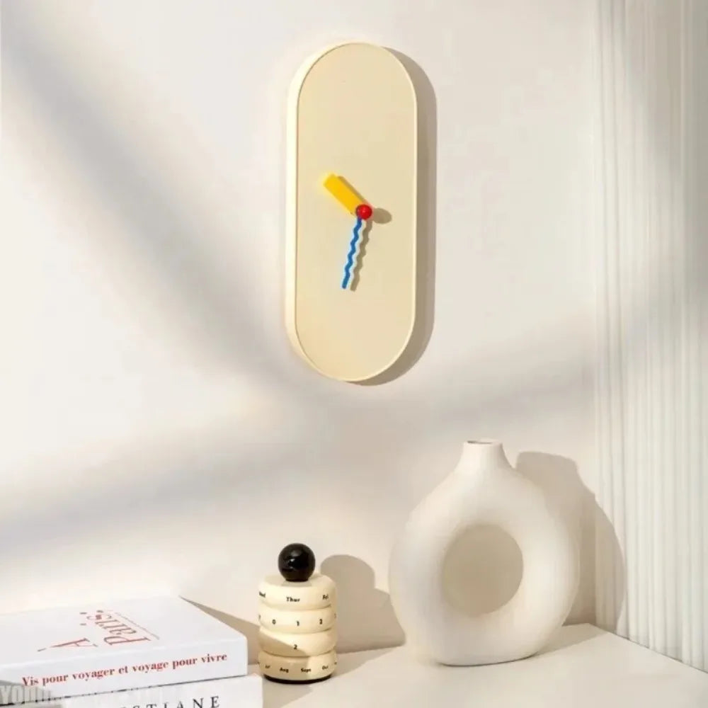 horloge murale moderne aiguille motif abstrait beige jaune bleu rouge contemporain
