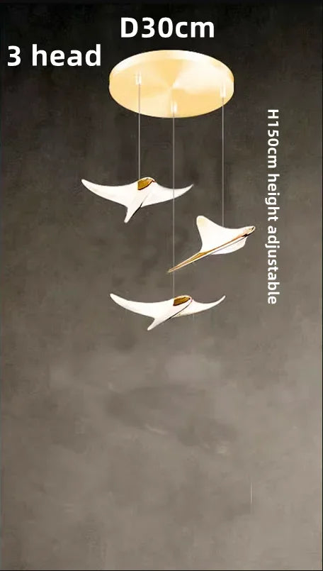 suspension lumineuse or oiseaux stylisés contemporaine minimaliste salon chaînes fixations métal lumière blanche chambre