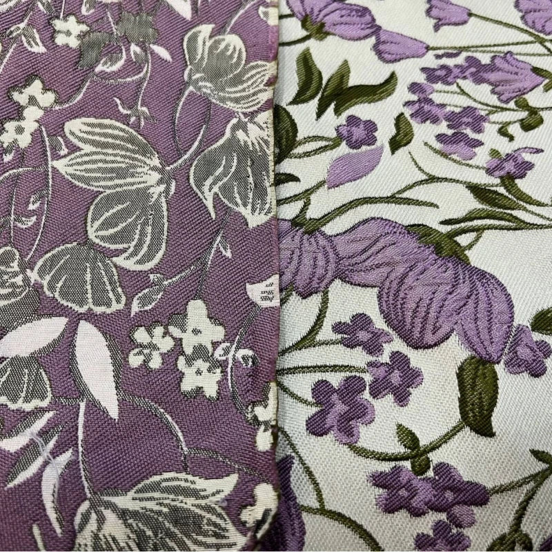 tissu polyester brocart motifs fleurs violet blanc vert protection uv largeur 145cm brodé motifs