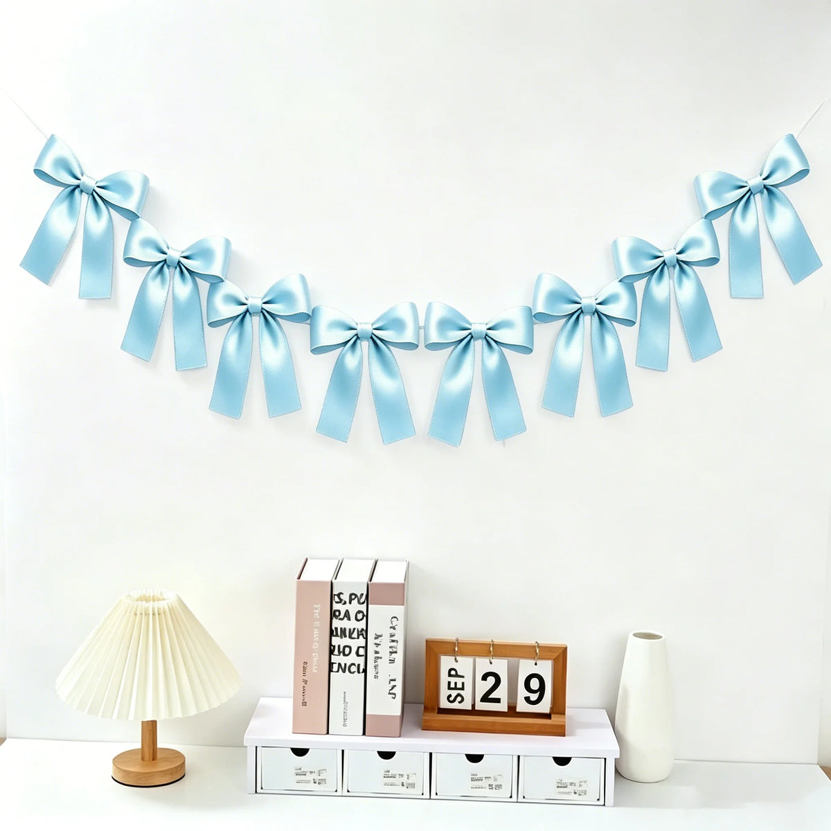 guirlande décorative nœuds papillon satin bleu clair rose noir mariage anniversaire fête