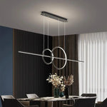 suspension lumineuse moderne or noir minimaliste câbles suspendus panneaux texturés