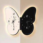 horloge murale moderne aiguille lumineuse papillon noir blanc salon résine