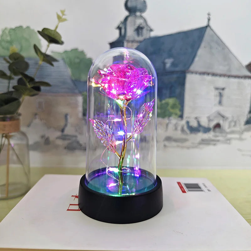 lampe led rose stabilisée dorée feuilles vertes moderne nuit multicolore base noire verre transparent