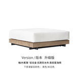 canapé extérieur modulable gris foncé tissu bois naturel coussins pieds noirs moderne minimaliste