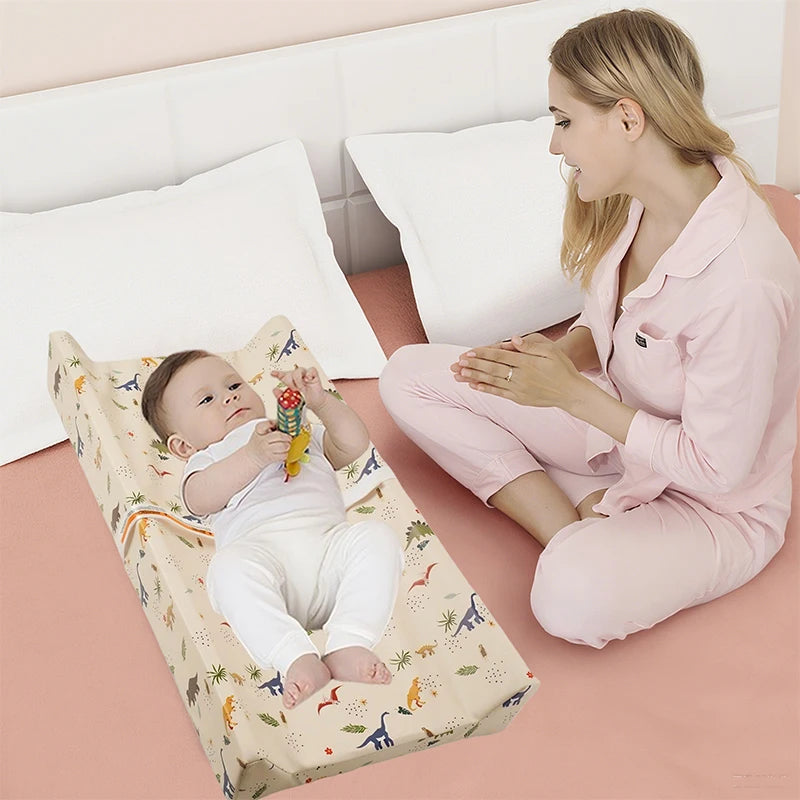 tapis changement bébé beige bleu clair imprimé dinosaures poissons ceinture sécurité moderne pratique