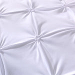Détail de la housse de couette grise en polyester