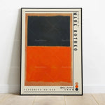 L'image montre une peinture abstraite composée de blocs rectangulaires de couleur noire et orange, avec une bordure de cadre noir. Le titre de l'œuvre, "Tangerine on Red", est imprimé en bas de l'image.