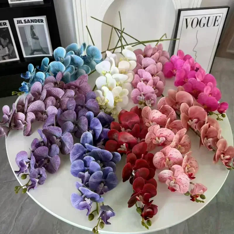 décoration intérieure orchidées artificielles violettes bleues blanches roses fleurs détaillées réaliste occasion fête maison