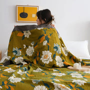 couverture décorative motif floral stylisé bohème moderne vert olive blanc orange gris foncé