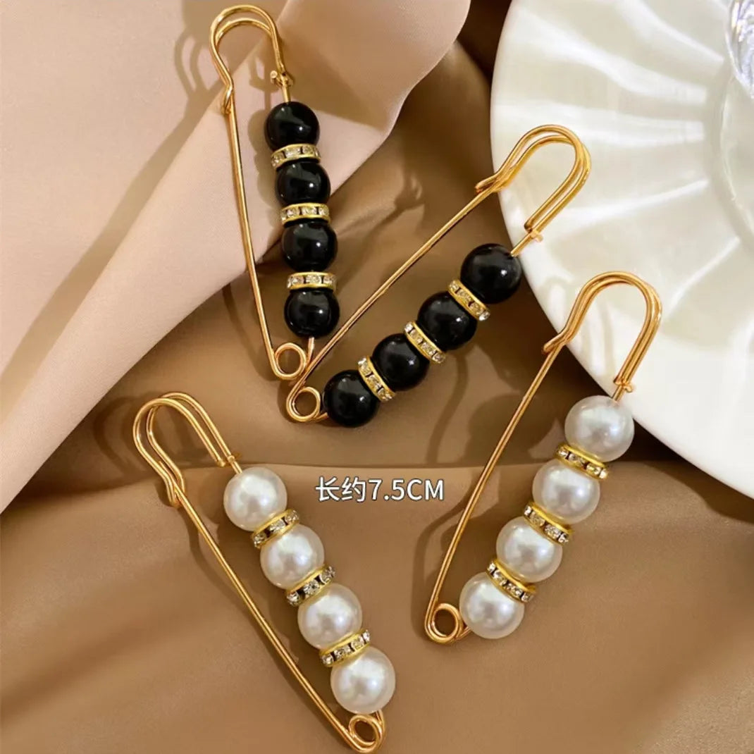 broches ornementales strass classiques élégantes clips or noires rouges