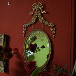 miroir ovale doré orné fleurs vintage baroque chambre coucher décoration murale