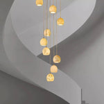 suspension lumineuse moderne marbre beige cuivre salon salle manger cuisine