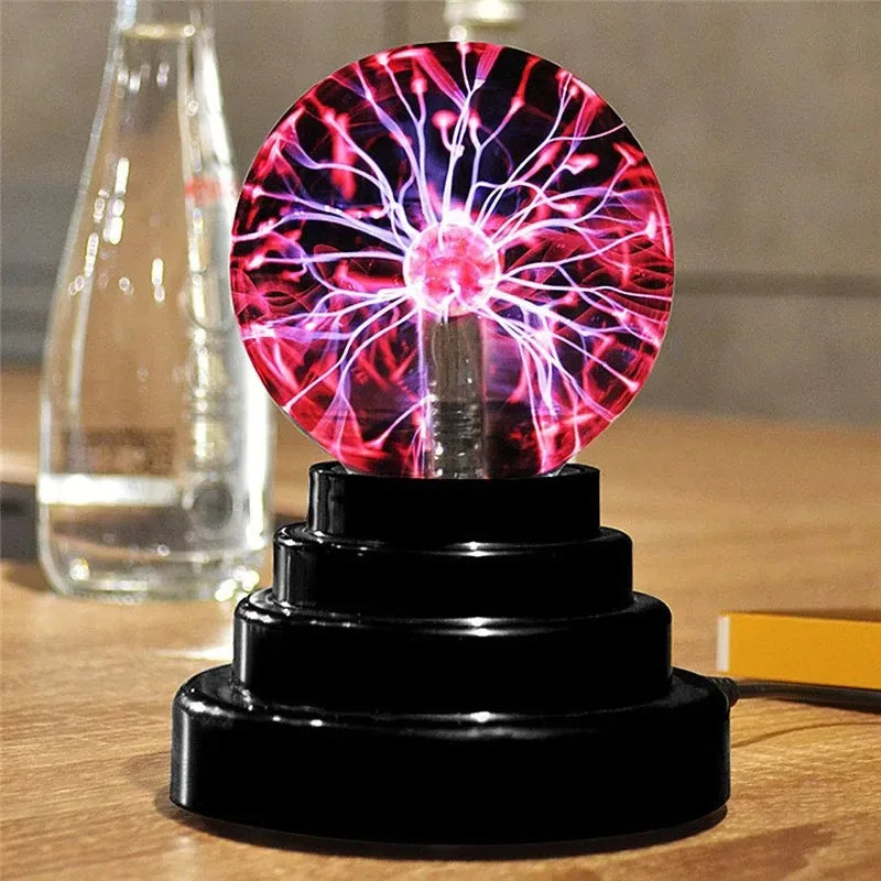 boule plasma luminescente tactile verre noir rouge bleu moderne technologie base pyramidale câble alimentation